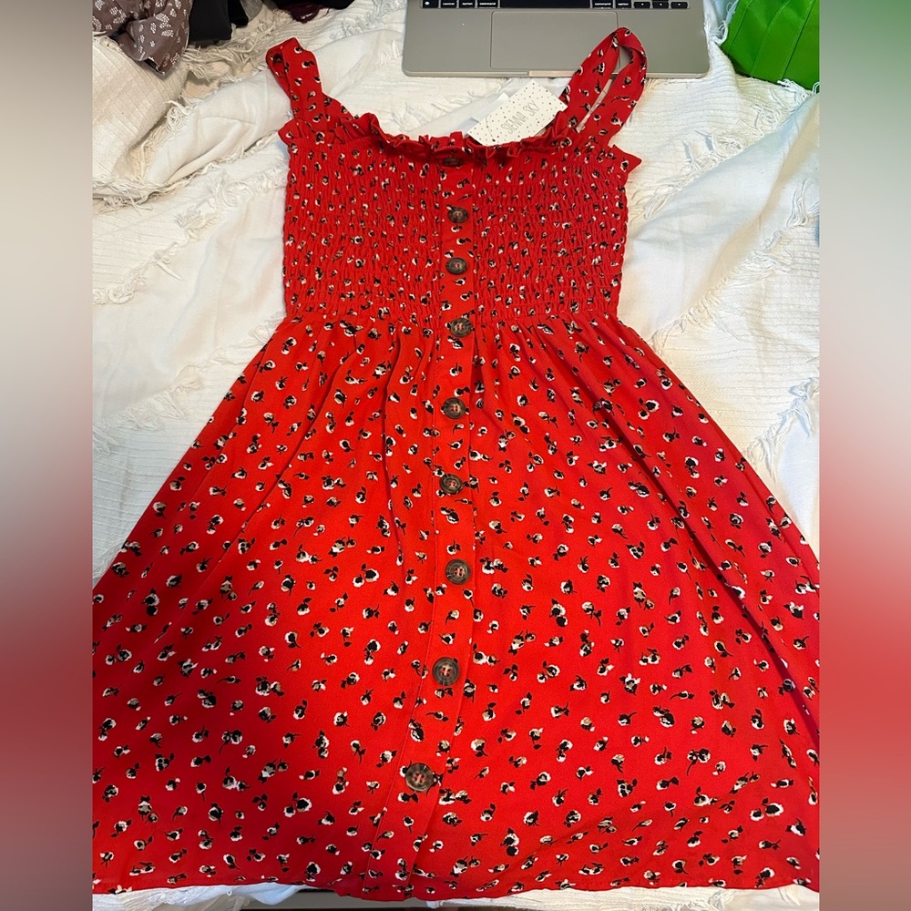 Sienna Sky dress. Size extra small. Red floral with buttons down the front. NWT.